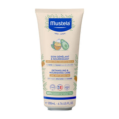 Mustela detangling and nourishing care product on a white background