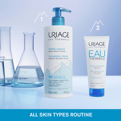 Two Uriage skincare products on a blue background with laboratory equipment.