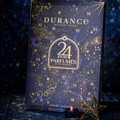 Durance perfume calendar with starry night design on a dark background