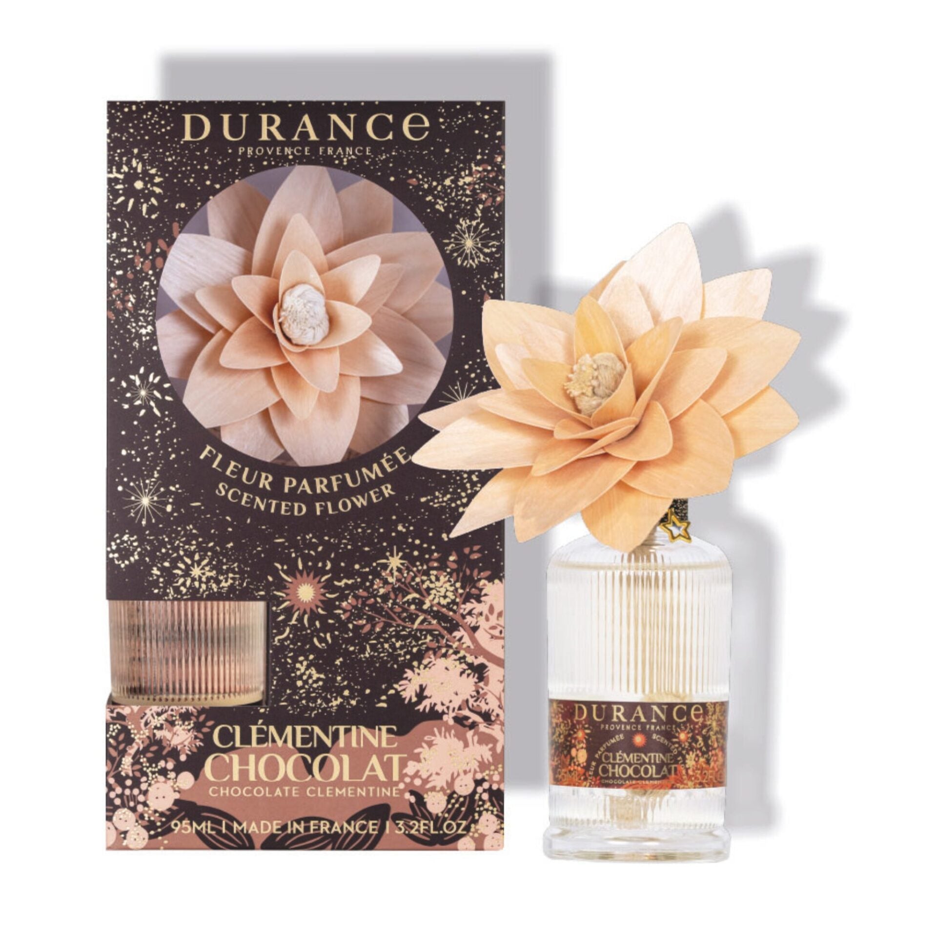 Durance Clementine Chocolate scented flower packaging and bottle on a white background