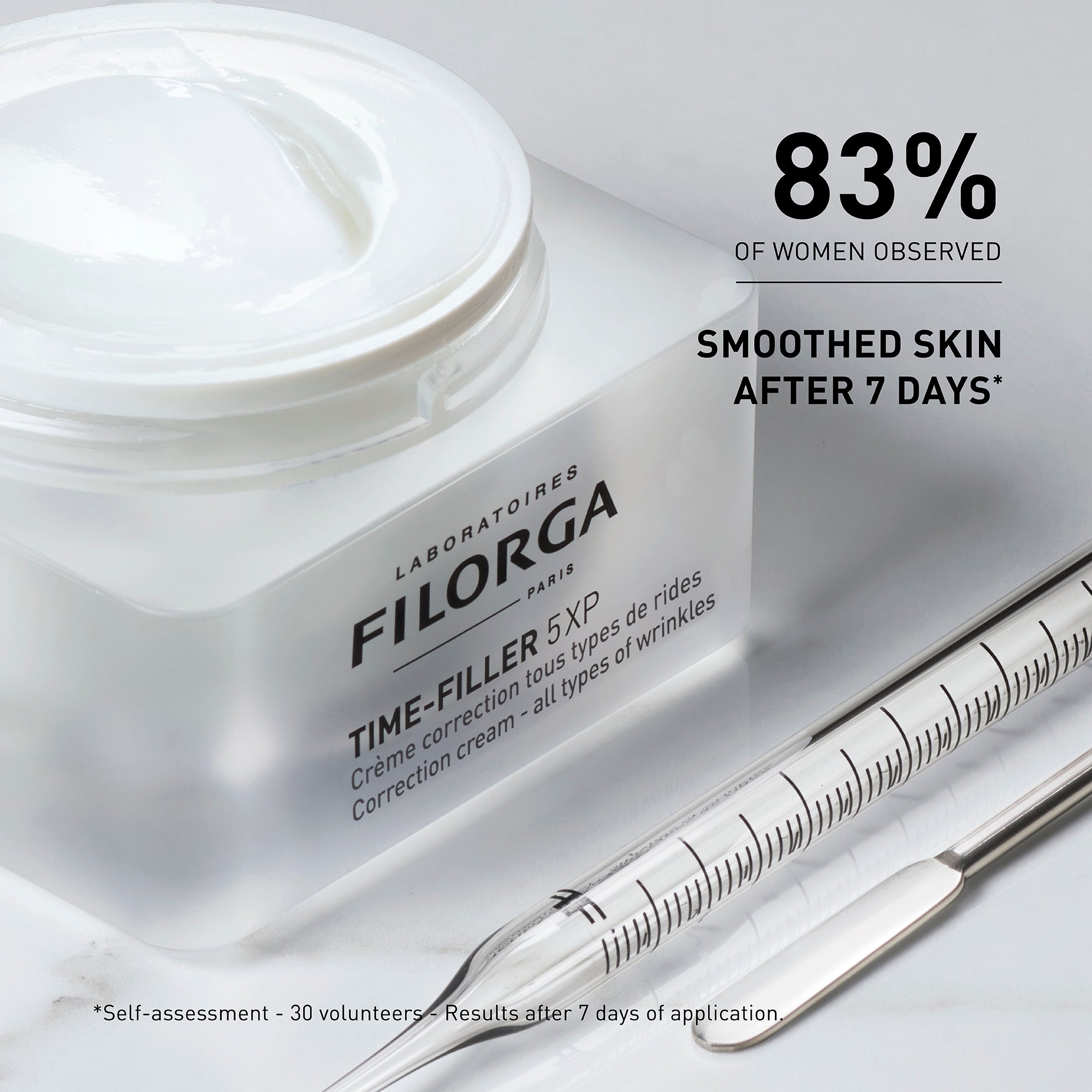 Filorga Time-Filler5XP cream jar with syringe on a white background