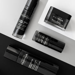 Filorga skincare products on a white and black surface