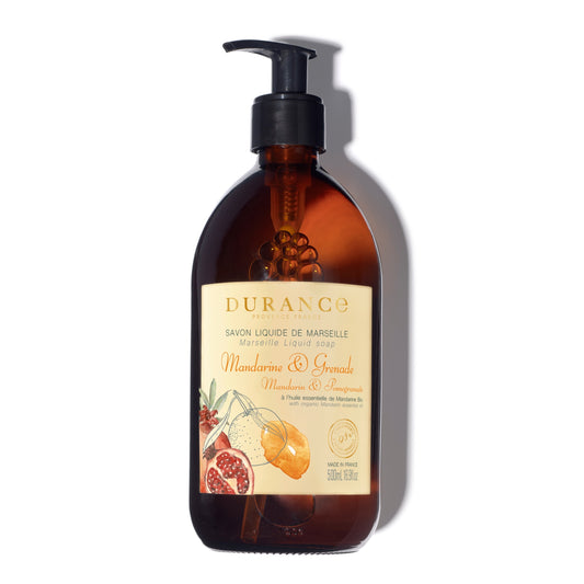 Brown bottle of Durance Marseille Liquid Soap with a label featuring mandarin and pomegranate graphics on a white background.