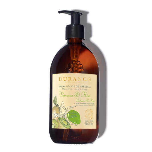 Brown bottle of Durance soap with a label on a white background
