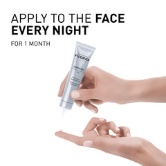 Hand holding a skincare product with text on a white background